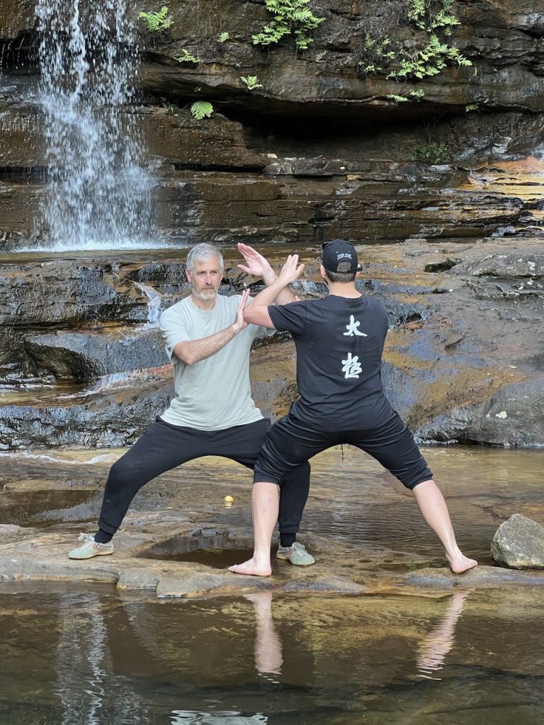 Push Hands by the waterfall