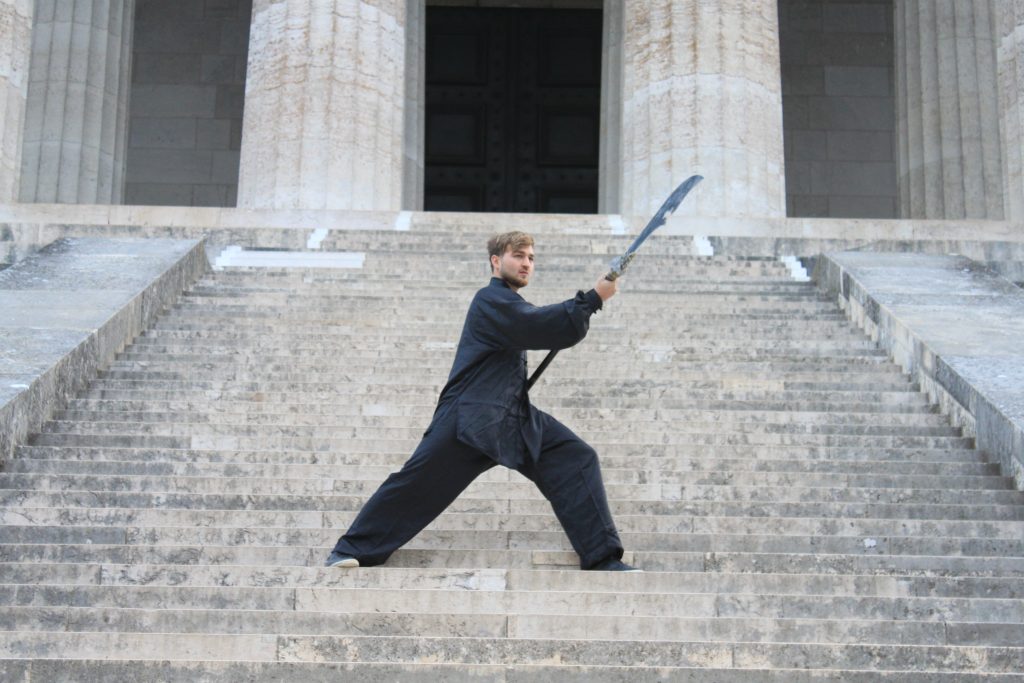 Tai Chi balance training with student