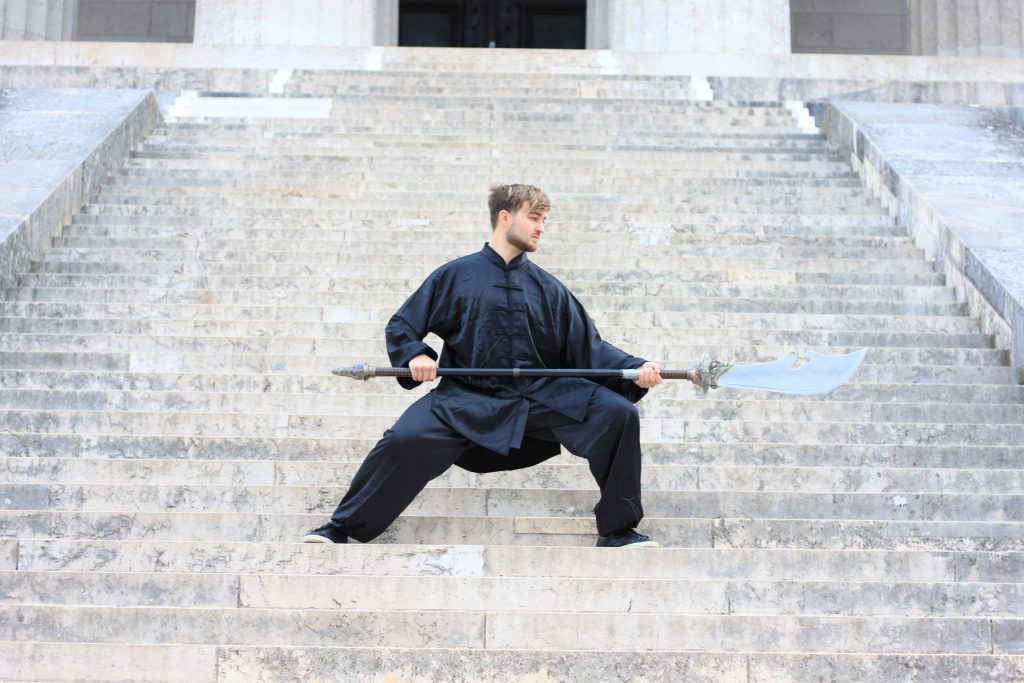 Tai Chi balance posture on temple stairs