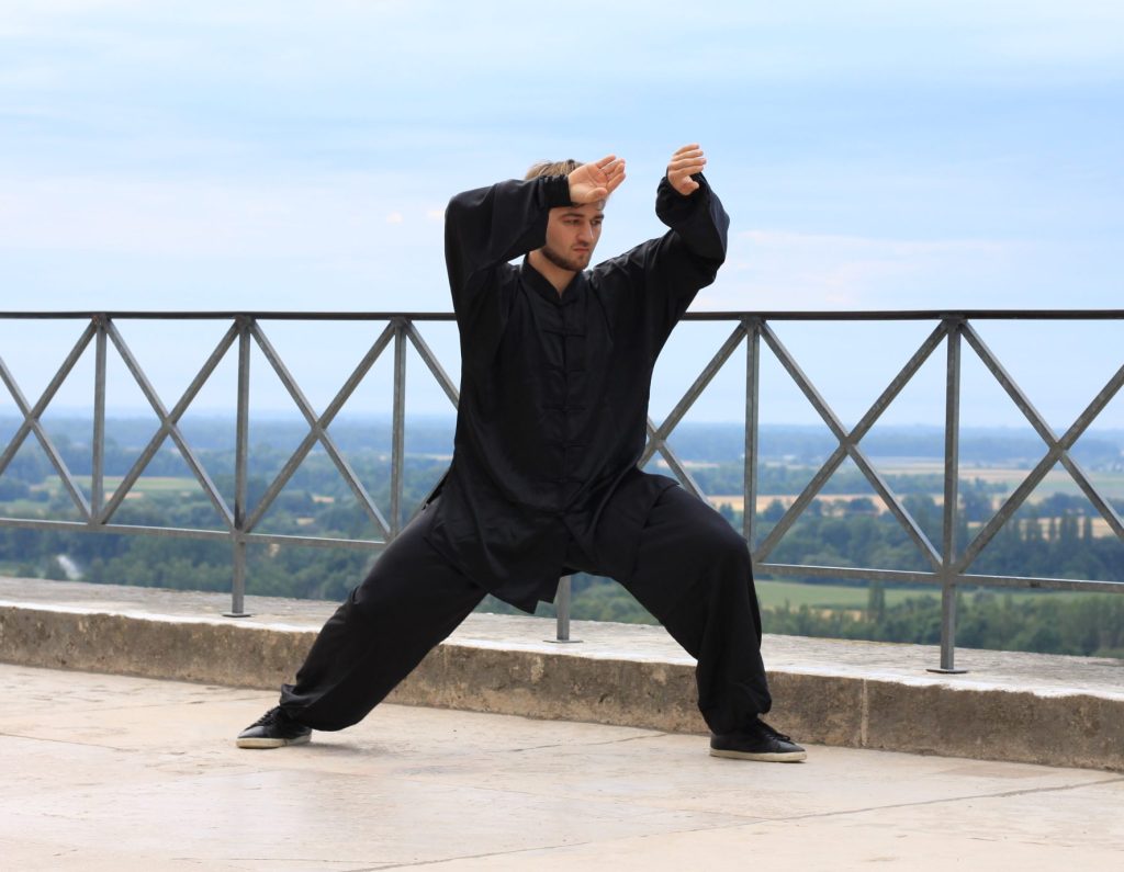Focused stance with mountain view