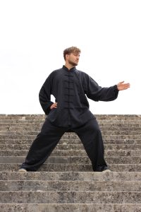 Tai Chi student in double-hand form